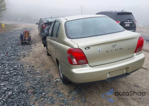 2002 Toyota Echo из США, поврежденный, VIN JTDBT123520217947